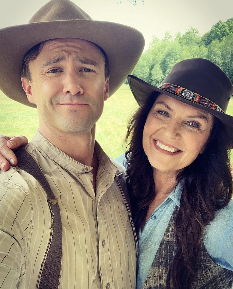 Tammy & Morgan in wearing Cowboy hats